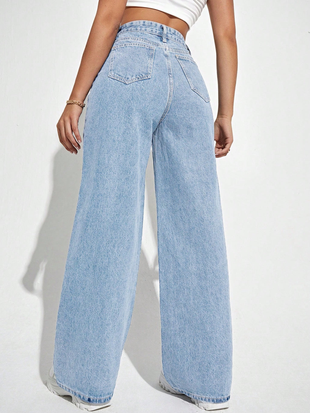 Jeans droits à taille haute lavés de manière décontractée