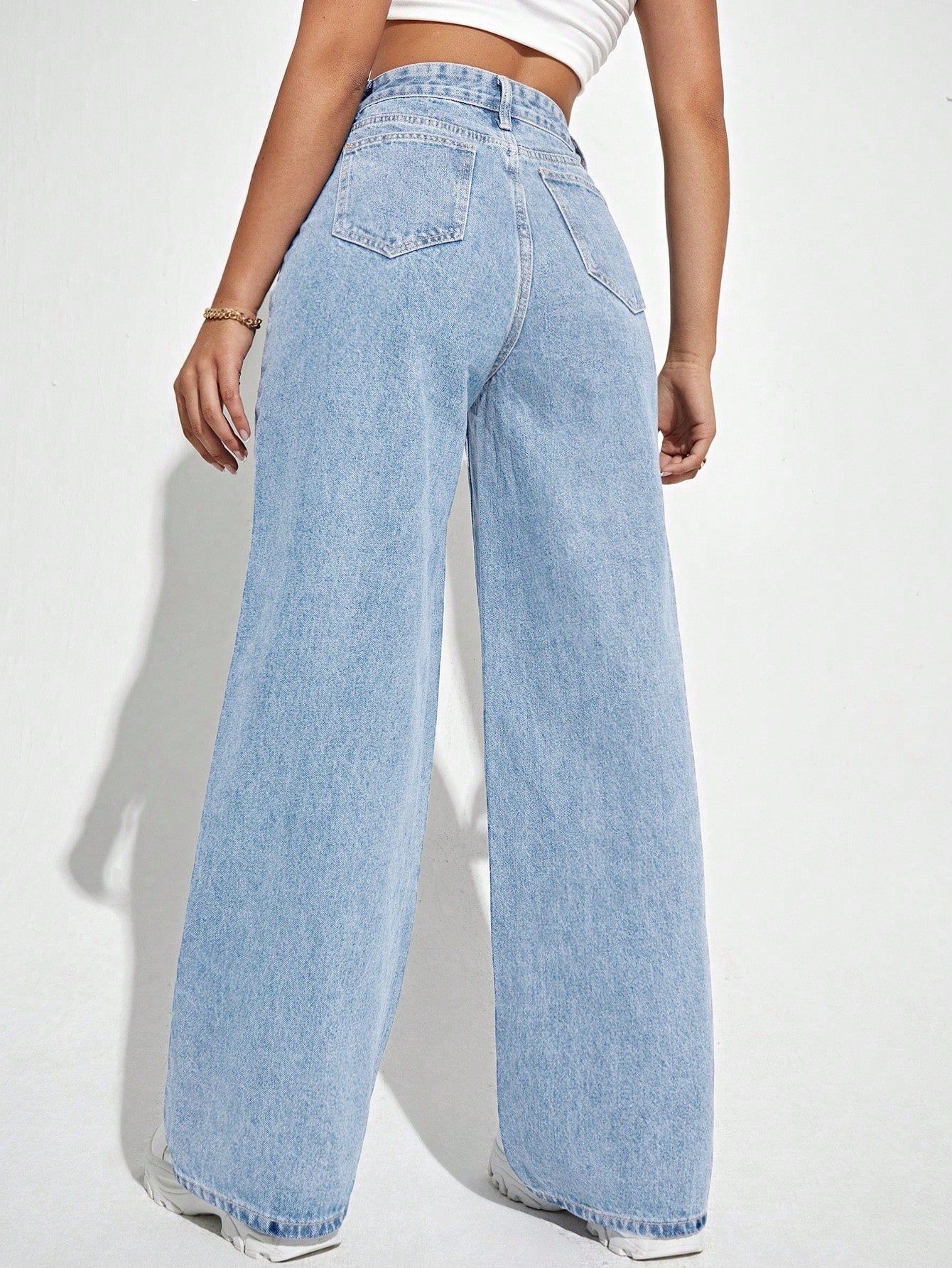 Jeans droits à taille haute lavés de manière décontractée