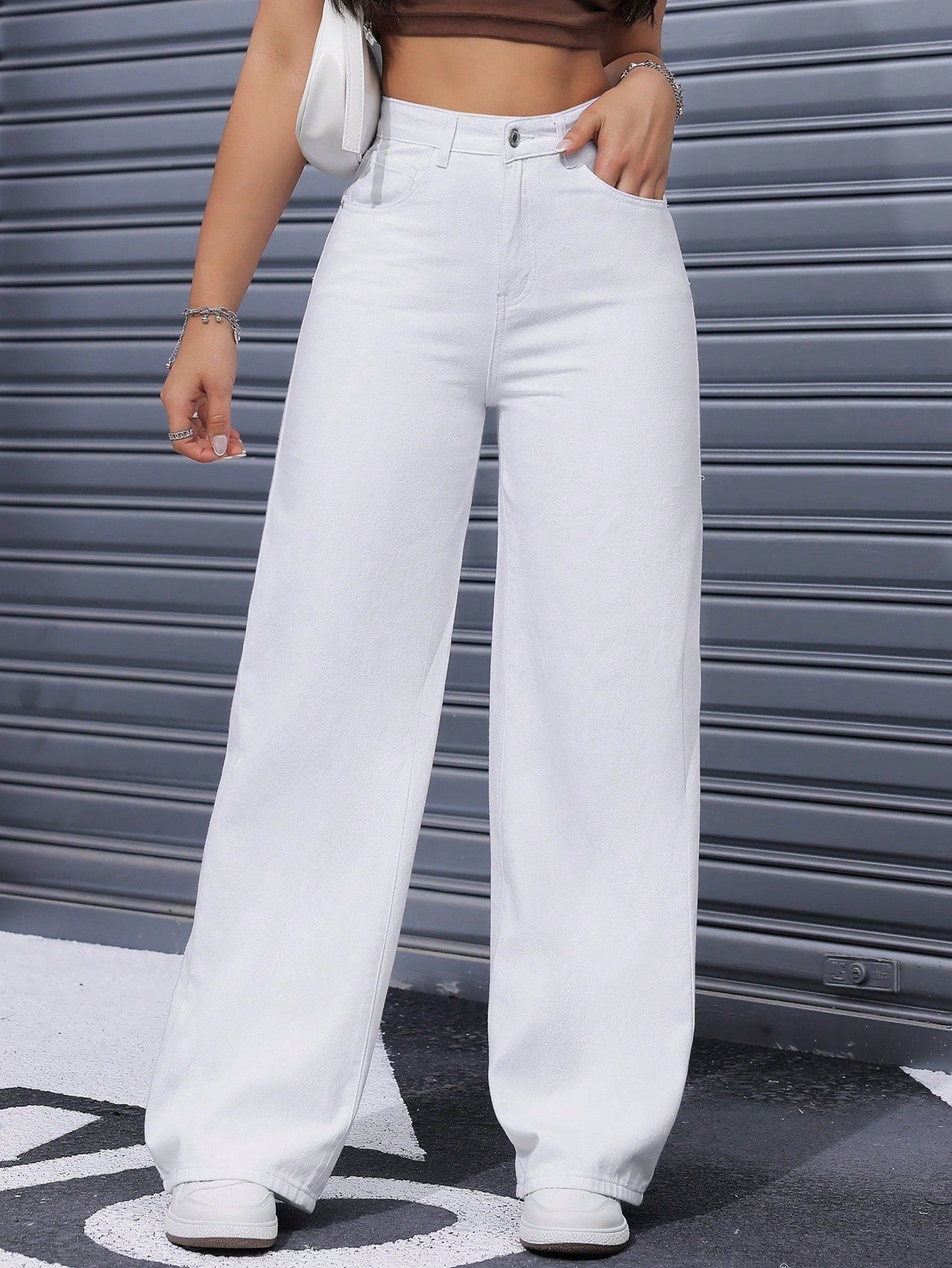 Jeans droits à taille haute lavés de manière décontractée